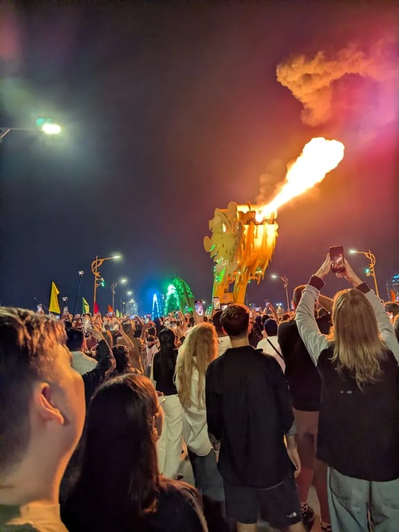 The Dragon Bridge breathing fire over the crowd in Da Nang