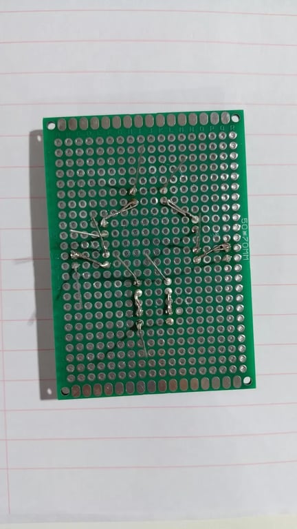 First solder joints and component leads on the rear of the keyring board