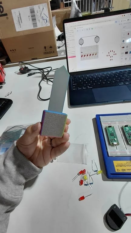 White 3D printed case fitted around the capacitive soil-moisture sensor