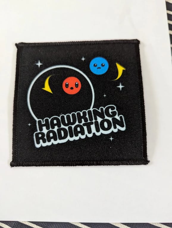 Hawking Radiation patch — cartoon particles escaping a black hole