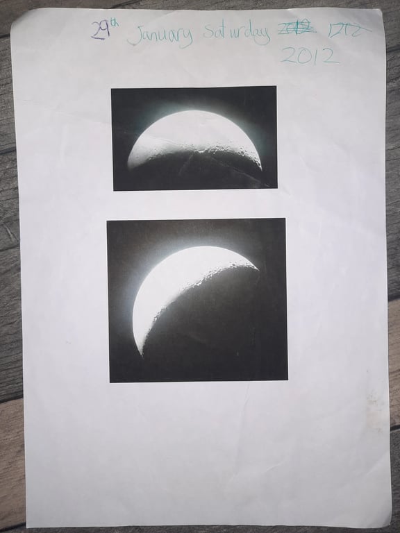 Crescent moon photographed through telescope, January 2012