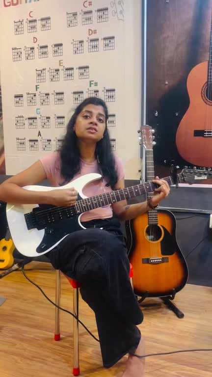 Guitar student performing at The Music Room in Pune