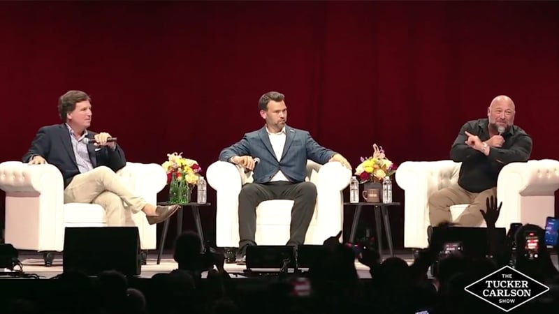 Watch: Alex Jones Lays Out Battle Plan to Defeat NWO During Live Tour With Tucker Carlson