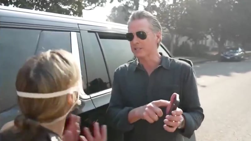 Watch: Gov. Newsom Fakes Phone Call with Biden as Angry Resident Confronts Him