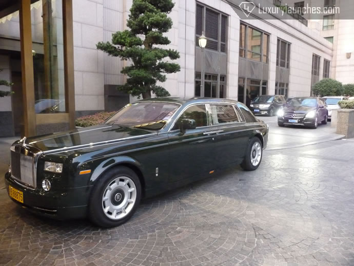 Our pick up - Rolls Royce Extended wheelbase Phantom in Peninsula green.