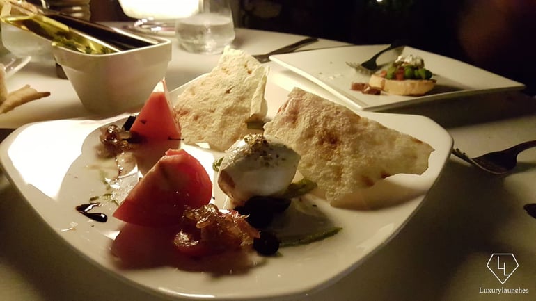 We enjoy some filling and soft Burrata at Splendido