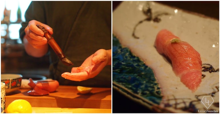 Chef Yoshi brushing soy sauce on Otoro Sushi