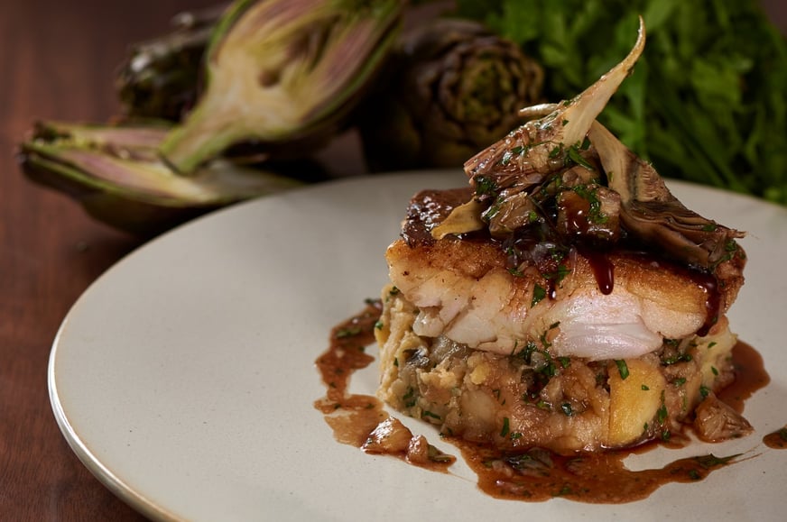 roasted_cod_with_crushed_potatoes__artichoke__salted_capers_and_a_red_wine_lemon_sauce