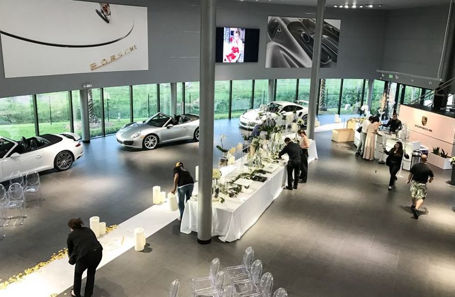 married-in-a-porsche-showroom-4