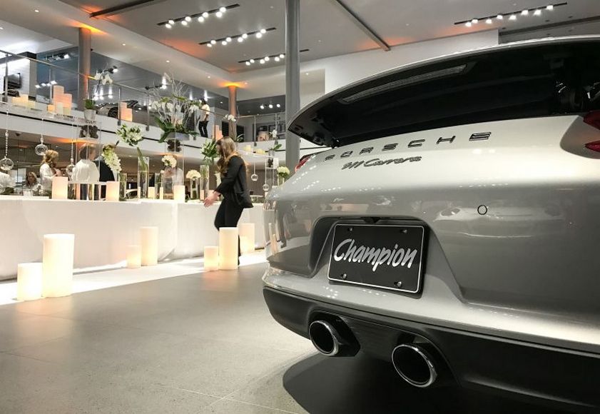 married-in-a-porsche-showroom-5