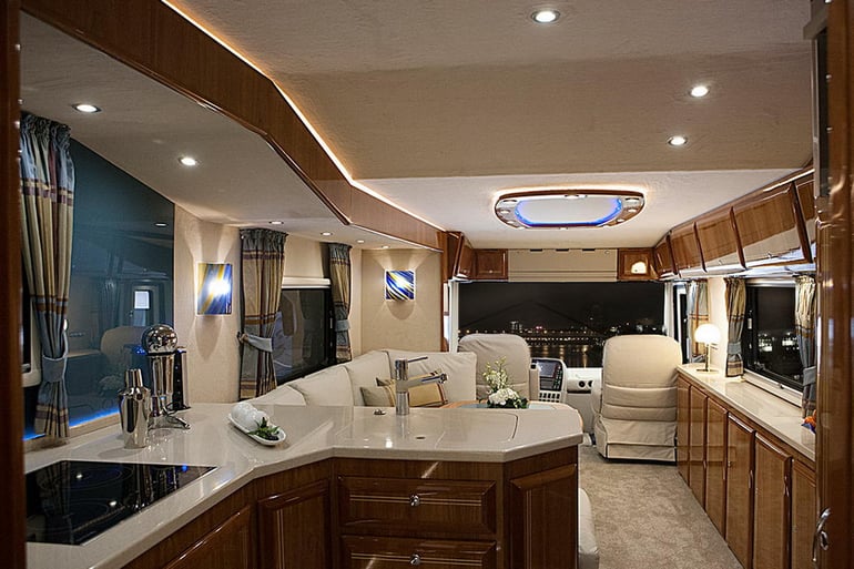 Drivable Rv Inside A full kitchen, marble countertops, motorized TV and a hidden supercar ...
