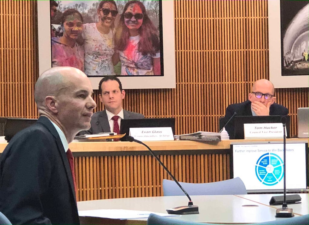 WMATA government relations officer Charlie Scott, left, presents WMATA's proposed 2021 budget at a town hall in Silver Spring, Maryland, Monday, March 2, 2020, as Montgomery County Council members Evan Glass and Tom Hucker, right, look on. (Photo by Sean McGoey)
