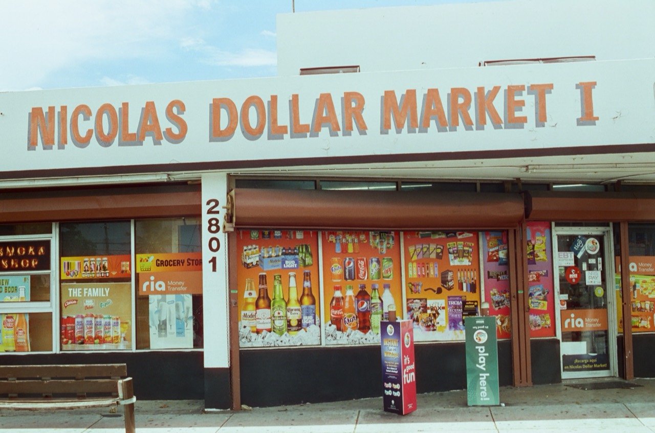 The Nicolas Dollar Market storefront during Raley’s Miami trip, photographed on film.