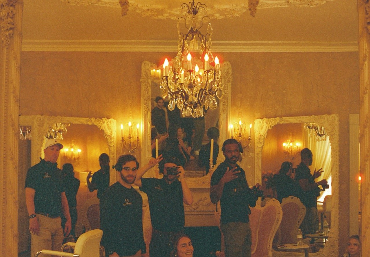 The crew in the mirror.