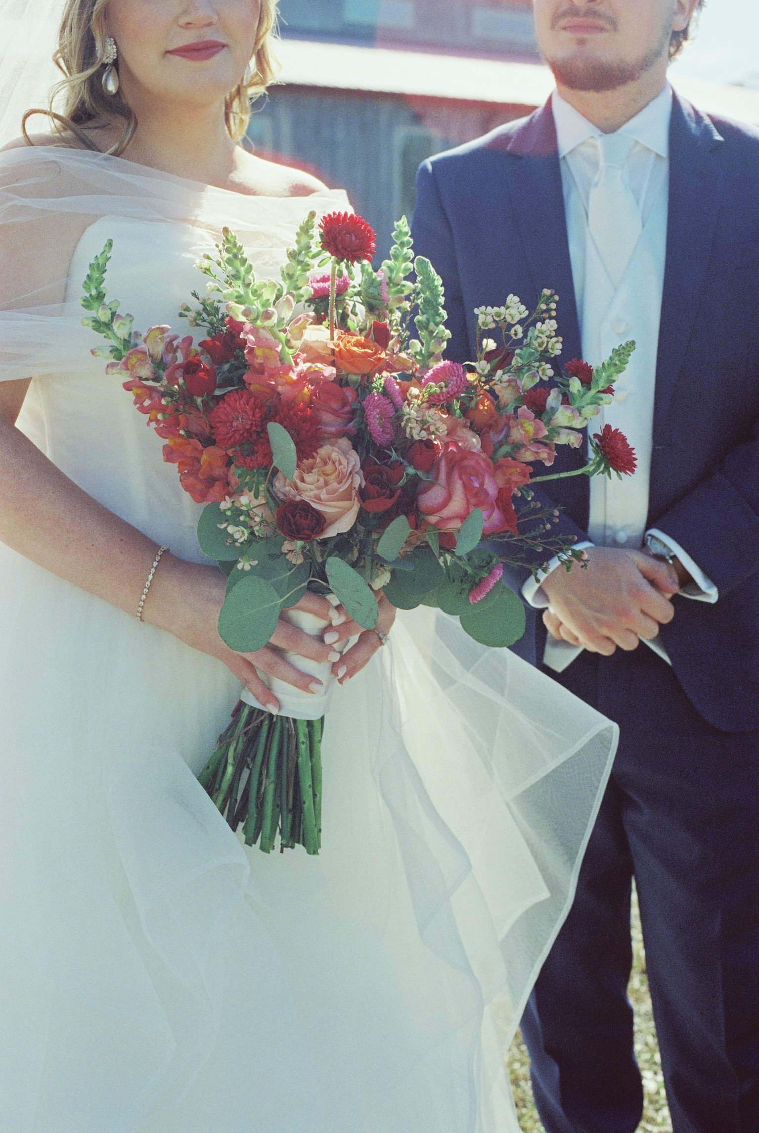 Claudia & Garrett Faulkner: The dress, flowers and wedding details.