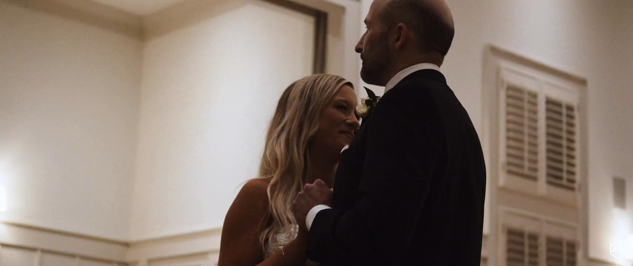 Madalyn and her dad share a dance at the reception. Still from their Midsummer Productions wedding film.