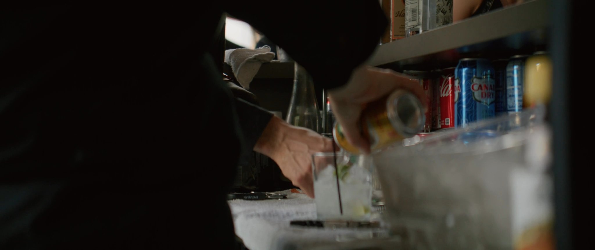 Champagne being poured at the reception. Still from their Midsummer Productions wedding film.