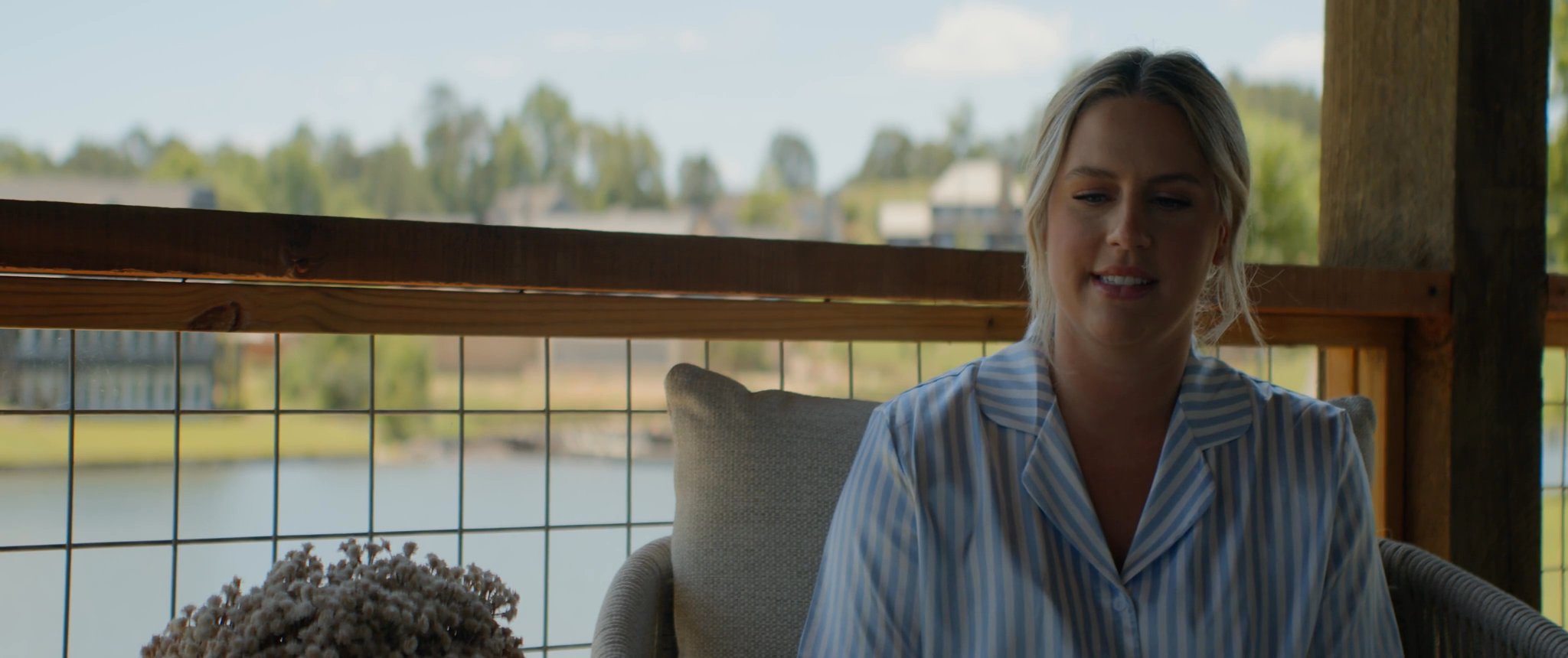 Julianna talking on the porch before the wedding. Still from their Midsummer Productions wedding film.