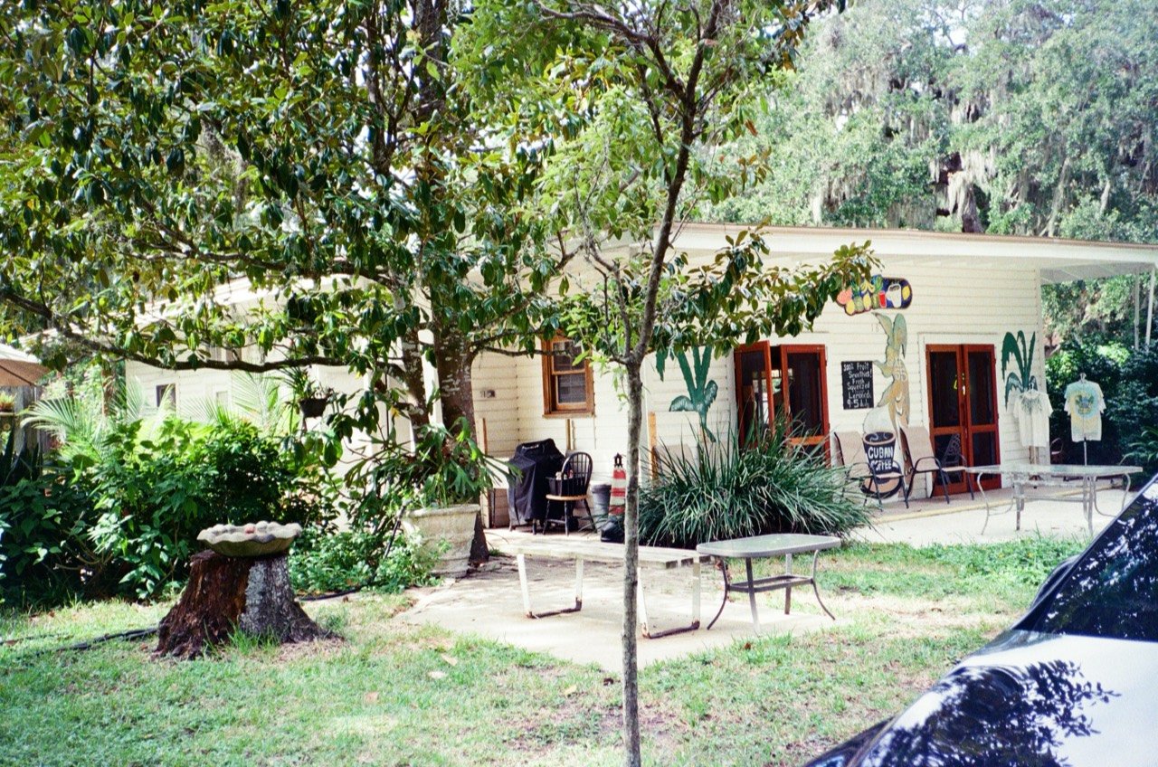 A café shaded by trees in St. Augustine.