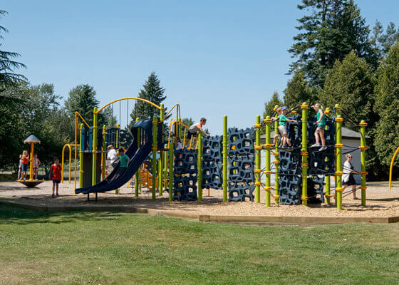 http://Kids%20playing%20on%20a%20playground%20in%20Brydon%20Park,%20Langley