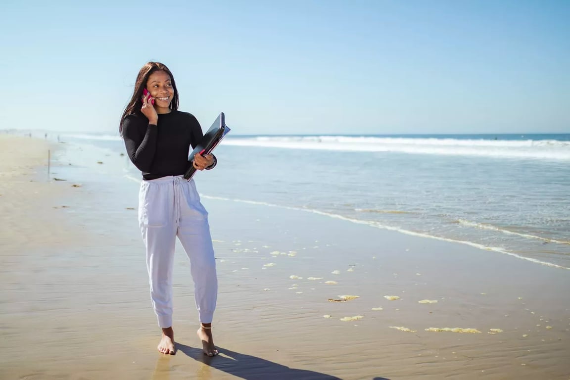 woman-working-on-beach-1.png