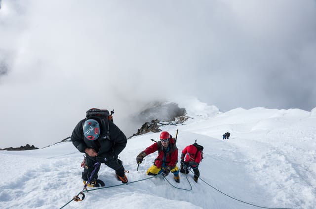 Lobuche Expedition — Climbers roped together on steep ascent