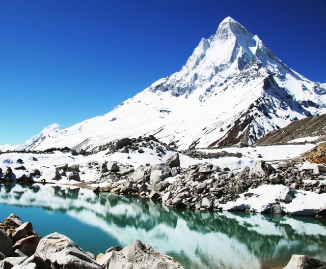 Shivling & alpine lake reflection