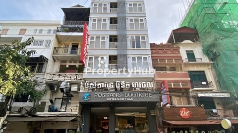 អគាhotelលក់បន្ទាន់នៅមាត់ទន្លេរ