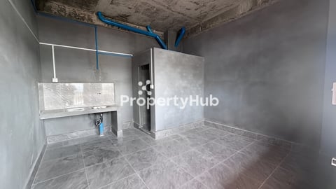 ដីទល់មុខរោងចក្រអាវលឿង