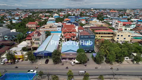 Prime Land Plot with 2 Villas for Sale – Main Commercial Road, Takhmao (Road 21)