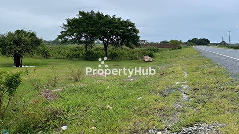 39m/45m x 85m/77m Land for Sale Big Front on main road face to National Stadium
