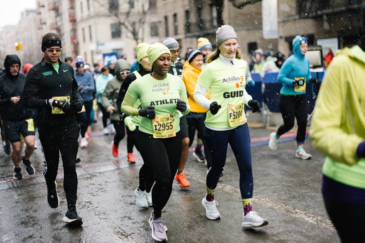 Jasmine at the NYRR Washington Heights Salsa, Blues, and Shamrocks 5K with Achilles International.