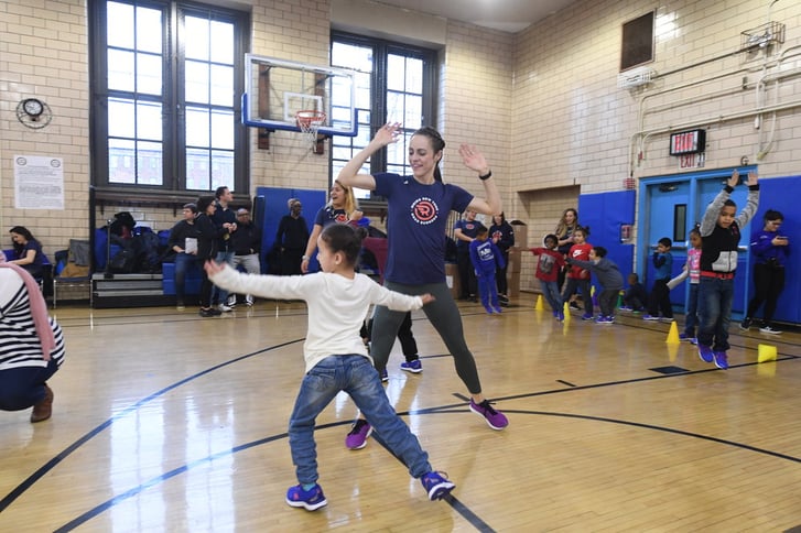 Kids got to play games with Olympian Jenny Simpson at the 1 for You 1 for Youth shoe distribution in Red Hook.