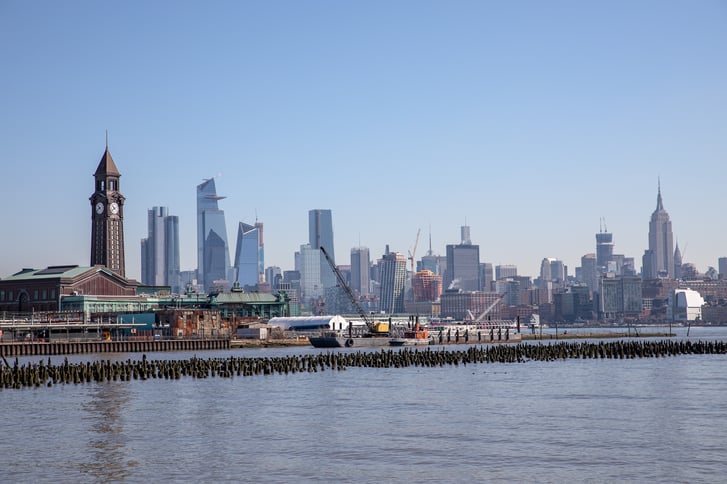 The Hoboken train terminal with the Manhattan skyline in the background