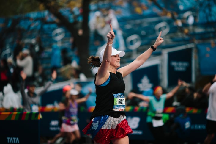 Woman finishing the TCS New York City Marathon
