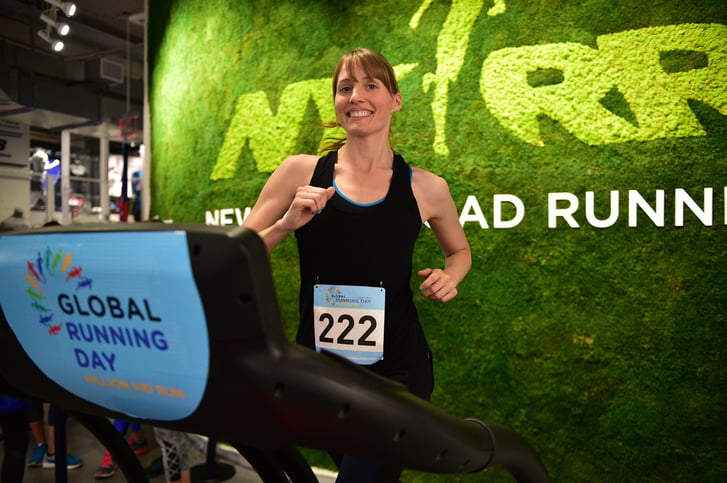 A runner in the Global Running Day Treadmill Challenge at the NYRR RUNCENTER