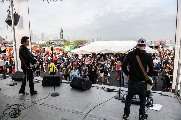 The music stage at the NYRR Newport Fiesta 5K post-race festival