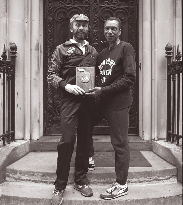 Ted Corbitt with Fred Lebow in front of NYRR headquarters in the 1980s.
