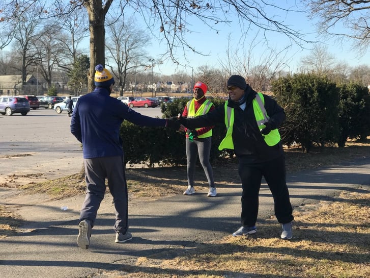 Mario encouraging a fellow Open Runner while volunteering in February 2019.