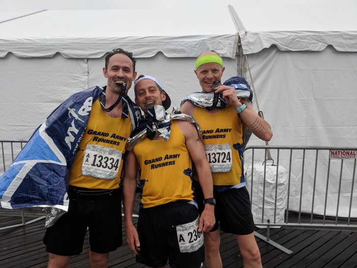 NYRR Member James Cameron and his running team The Grand Army Runners after a race