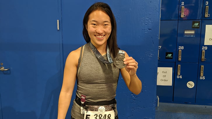Popular Brooklyn Half Finisher Diane with her medal
