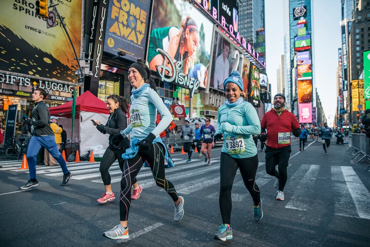 Runners racing through Times Square