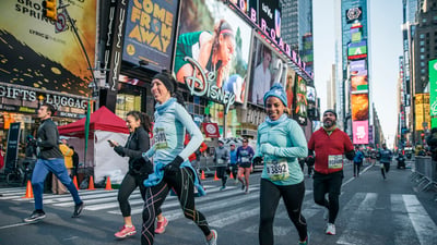 Runners racing through Times Square