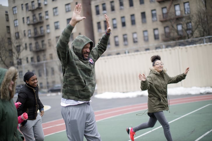 Ron Harper showing Rising New York Road Runners some exercises