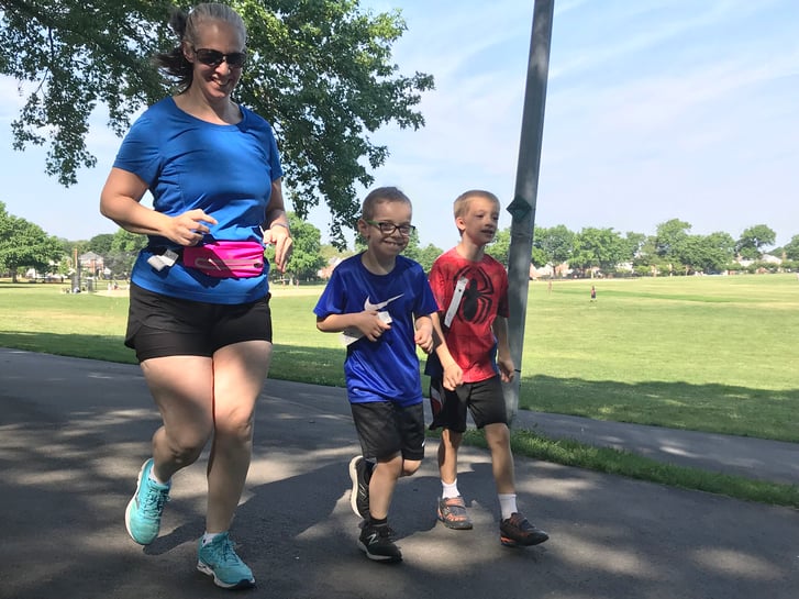 George running with mom, Stacy, and cousin, Seth.