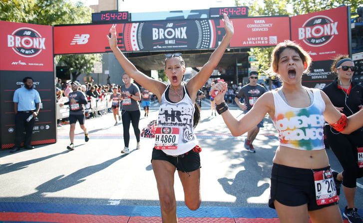 Harlem Run club member April Cargill at the Bronx 10 Mile finish line
