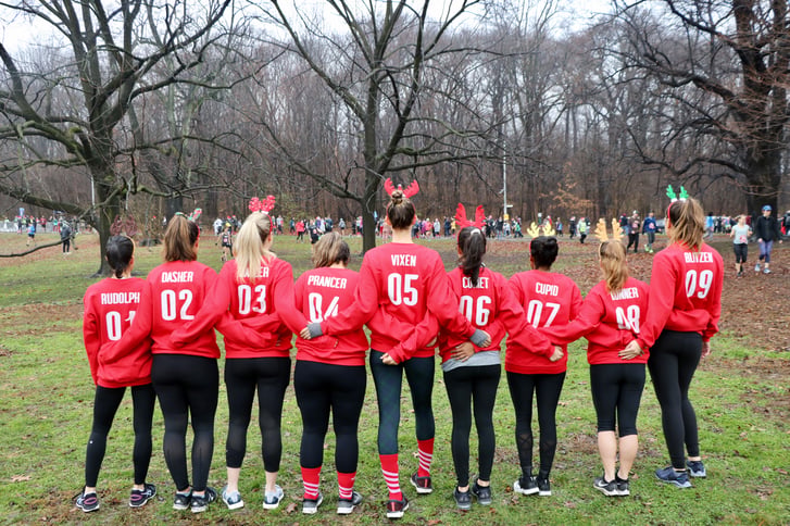 9 women in reindeer costumes at the Jingle Bell Jog 5K