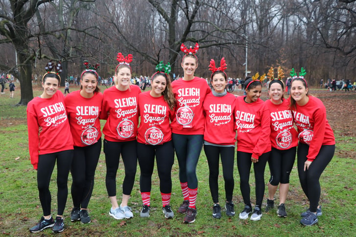 9 women in reindeer costumes at the Jingle Bell Jog 5K