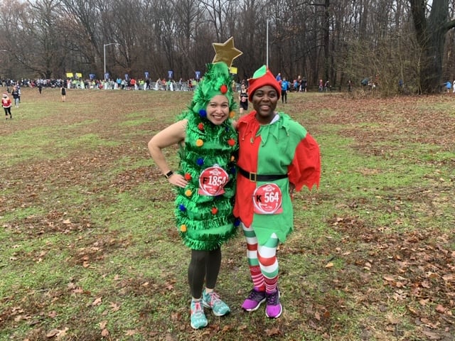 two women dressed in costume at jingle bell jog
