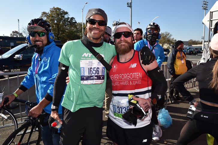 Micah Herndon, right, and his coach Roberto Mandje of NYRR, at the start of the TCS NYC Marathon.